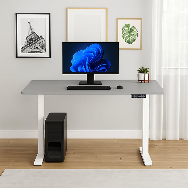 TWHEELS standing desk 140x80 cm with monitor in a bright home office