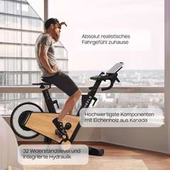 TWHEELS Indoor Bike aus Eichenholz mit 32 Widerstandsstufen und Hydraulik-System.