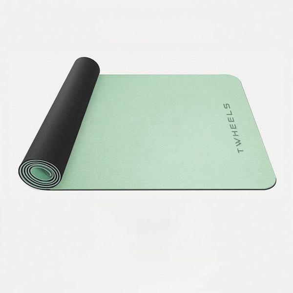 Tapis de yoga TWHEELS vert menthe à moitié déroulé