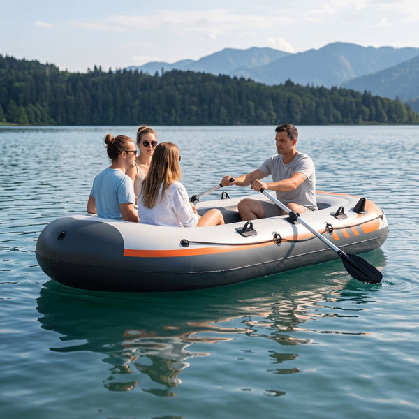 Four people in the larger TWHEELS inflatable boat for four people on a Swiss mountain lake