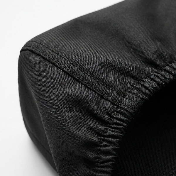 Gros plan sur la couture renforcée de la housse de protection