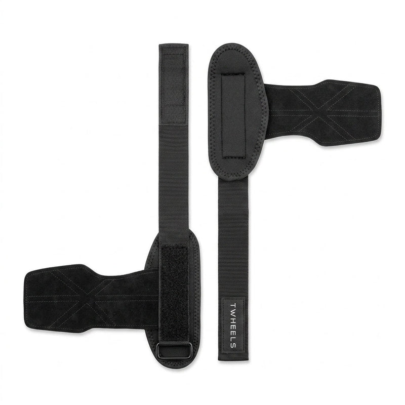 Paar schwarze TWHEELS Zughilfen mit Leder-Handschutz auf weissem Hintergrund.